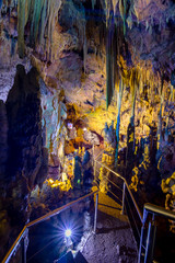 The magnificent and majestic caves of Diros in Greece. A spectacular sight of stalacites and stalagmites which took millions of years to form.The cave is located underground and can be viewed by boat.