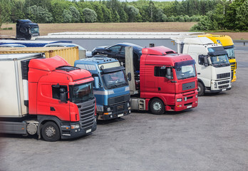 trucks in the Parking lot near the highway