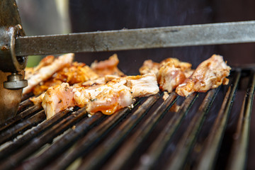 Slices of meat for Shawarma (Doner kebab) fried on the grill
