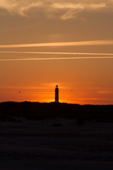 Sunset behind lighthouse