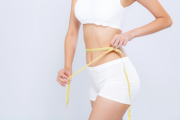 Asian woman diet and slim with measuring waist for weight isolated on white background, girl have...