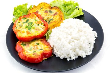 Scrambled eggs fried in the ring of sweet pepper.