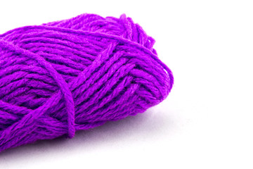 yarn ball with woolen thread on white background