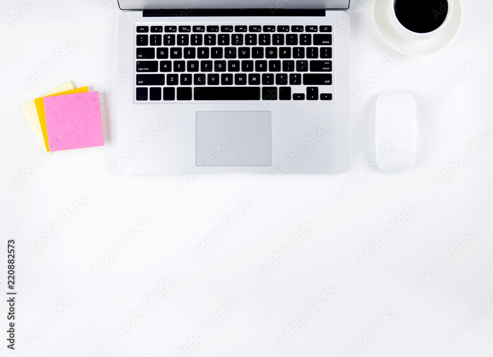 Wall mural top view of laptop computer and mouse, diary and notepad for reminder and a cup of coffee isolated o
