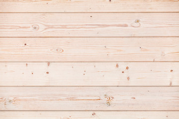 Obraz premium New wooden wall made of pine wood planks, texture
