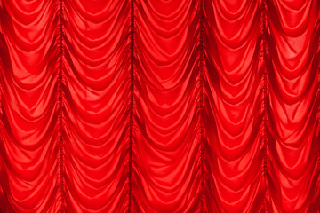 Red waving tulle curtain. Background photo texture