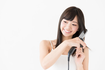 attractive asian woman hair care image on white background