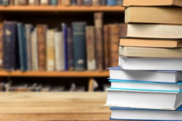 Collection of old books  on background