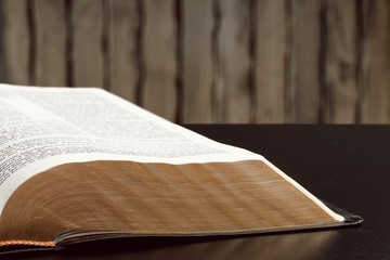 Holy Bible  book on a wooden background