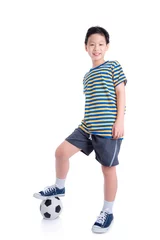 Foto op Canvas Young asian boy playing football over white background © gamelover