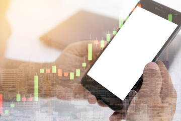 business man using smart phone with blank screen and blurred financial graph, concept of abstract image communication network, cyber security, internet of things, financial and future life.
