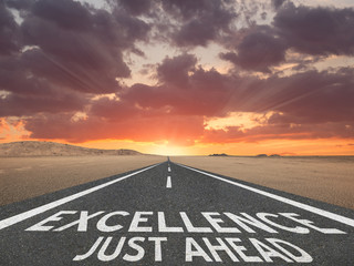 Excellence Just Ahead highway text for skilled greatness concept.