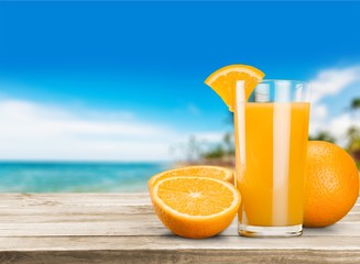 Orange juice and slices of orange on background © BillionPhotos.com