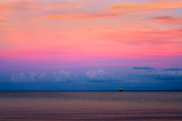 Beautiful sunset at Lake Superior with ship on horizon