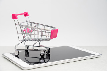 Collection of shopping cart  full of shopping time.Top view or flat lay composition cart on color background.online shopping concept.