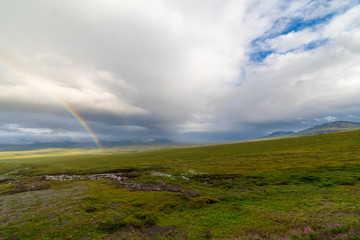 A Beautiful Arctic Rainbow Over The Northwest Territories Tundra