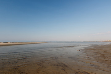 Tidal pool and waves on the Atlantic Ocean, Sunset Beach, North Carolina
