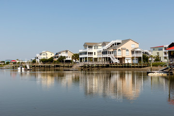 Fototapeta premium Luxury beach houses on the inter coastal waterway, Sunset Beach, North Carolina