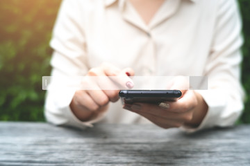 SEO, Search Engine Optimization and technology concept with woman hold smart phone on background.