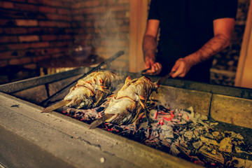 grilled fish food. grill from a dorado. dorado on skewers. aurata fish