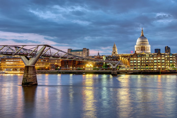 Fototapeta na wymiar St. Paul's cathedral and the Millennium Bridge in London, UK, after sunset