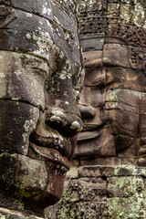 Close up of two huge stone faces