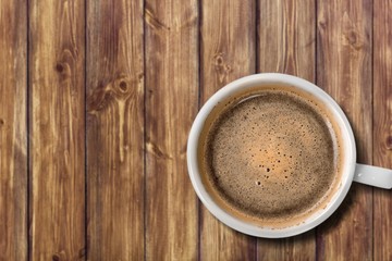 Coffee cup  on wooden background