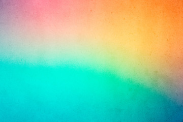 Colorful gradient watercolor paint on old paper with grain smudge dirty texture abstract for