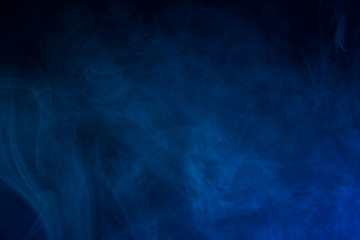 Colorful smoke close-up on a black background