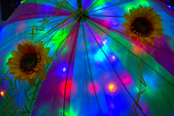 Background photo with beautiful light, umbrella and flowers