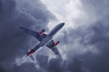 Jet in a dark stormy sky
