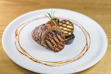 steak and grilled vegetables