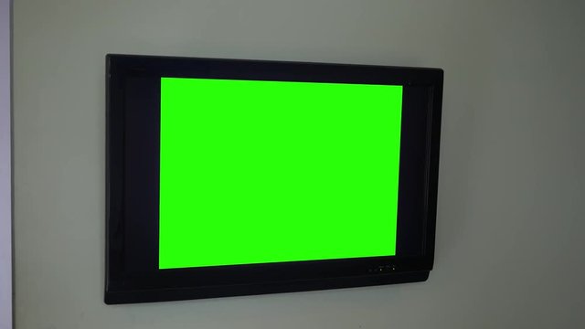 A green screen HD TV displaying a 4x3 Standard Definition signal