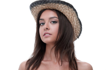Portrait of a beautiful young woman in cowboy hat