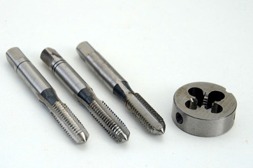 First, second, and plug tap and die for cutting of 6 mm threads.