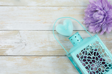 Lantern, candle and flower