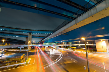 Fototapeta na wymiar Traffic under highway at night