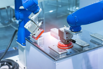 Industrial robot working in phone factory