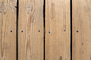 Wooden boards with iron inserts and nails. Texture, background