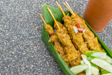 close up barbecue pork with cucumber