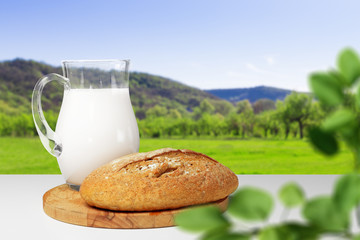 Bread and milk on the table