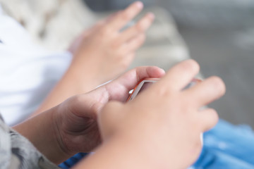 Smartphone in the hands of children.