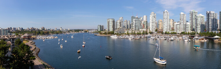 Fototapeta na wymiar Vancouver, BC, Canada - August 5, 2018: Aerial view of False Creek during a sunny summer day.