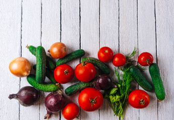 Vegetables on white wooden background