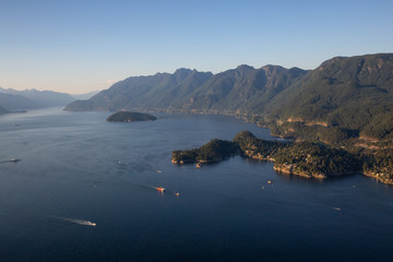 Aerial view of Horseshoe Bay in Howe Sound during a sunny summer evening. Located in West Vancouver, BC, Canada.