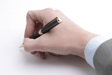 closeup .hand of a businessman signing the contract.