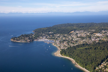 Fototapeta na wymiar Aerial view of Gibsons during a sunny summer day. Located in Sunshine Coast, Northwest of Vancouver, BC, Canada