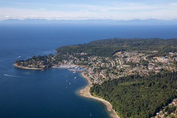 Naklejka na ściany i meble Aerial view of Gibsons during a sunny summer day. Located in Sunshine Coast, Northwest of Vancouver, BC, Canada