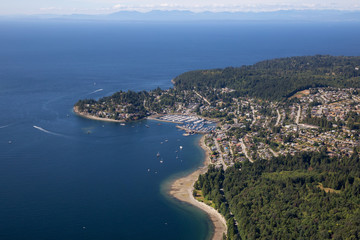 Aerial view of Gibsons during a sunny summer day. Located in Sunshine Coast, Northwest of Vancouver, BC, Canada - obrazy, fototapety, plakaty
