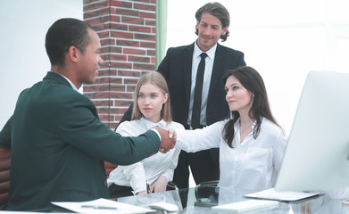 Business Partner Shake Hands on meetinig in modern office building